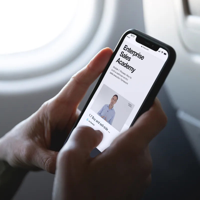 The Enterprise Sales Academy on a phone